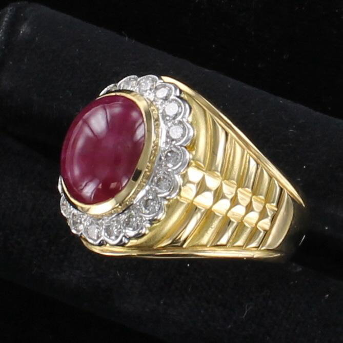 18KT CABOCHON RUBY AND DIAMOND RING