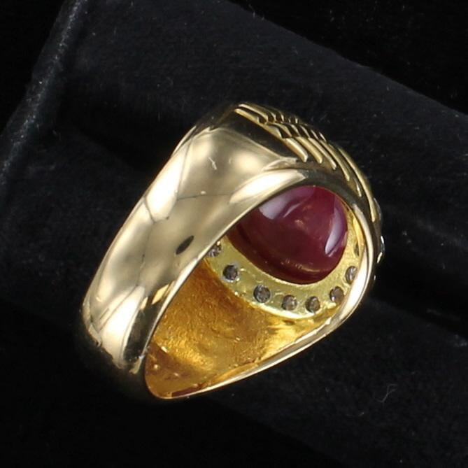 18KT CABOCHON RUBY AND DIAMOND RING