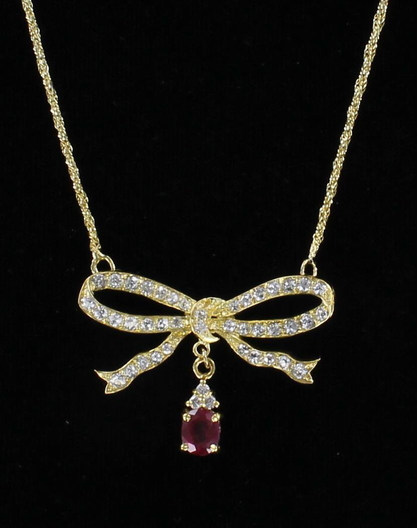 18KT DIAMOND AND RUBY BOW NECKLACE 198-22437