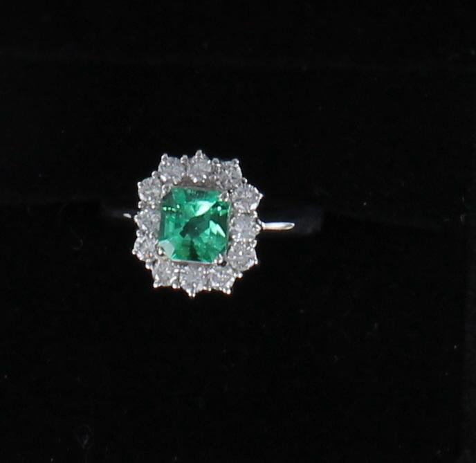 PLATINUM EMERALD AND DIAMOND RING