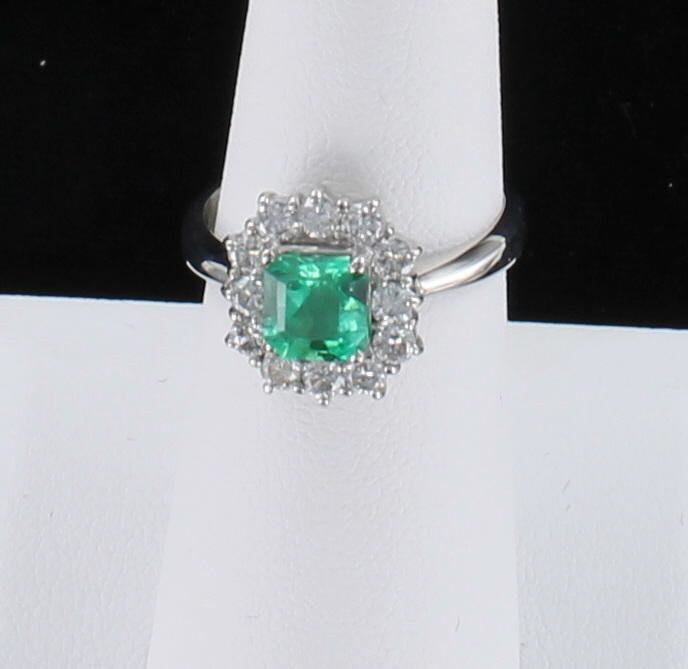 PLATINUM EMERALD AND DIAMOND RING