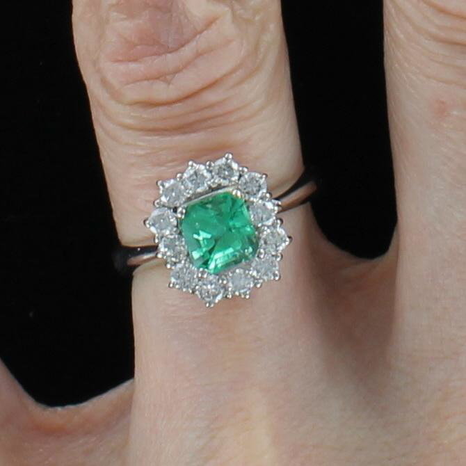 PLATINUM EMERALD AND DIAMOND RING