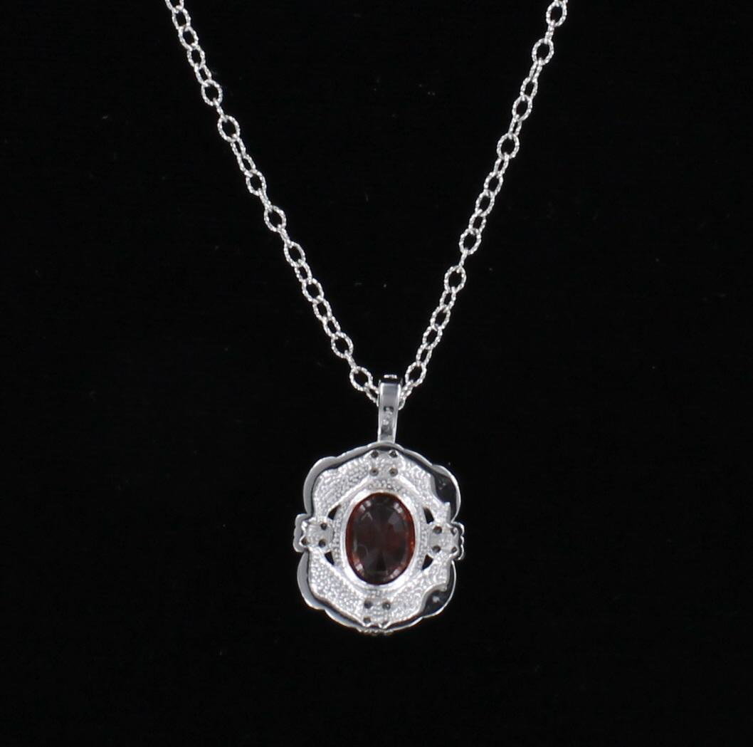 14KT 2.74 CT ORANGE SAPPHIRE PENDANT