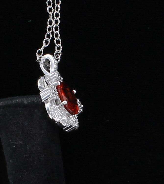 14KT 2.74 CT ORANGE SAPPHIRE PENDANT