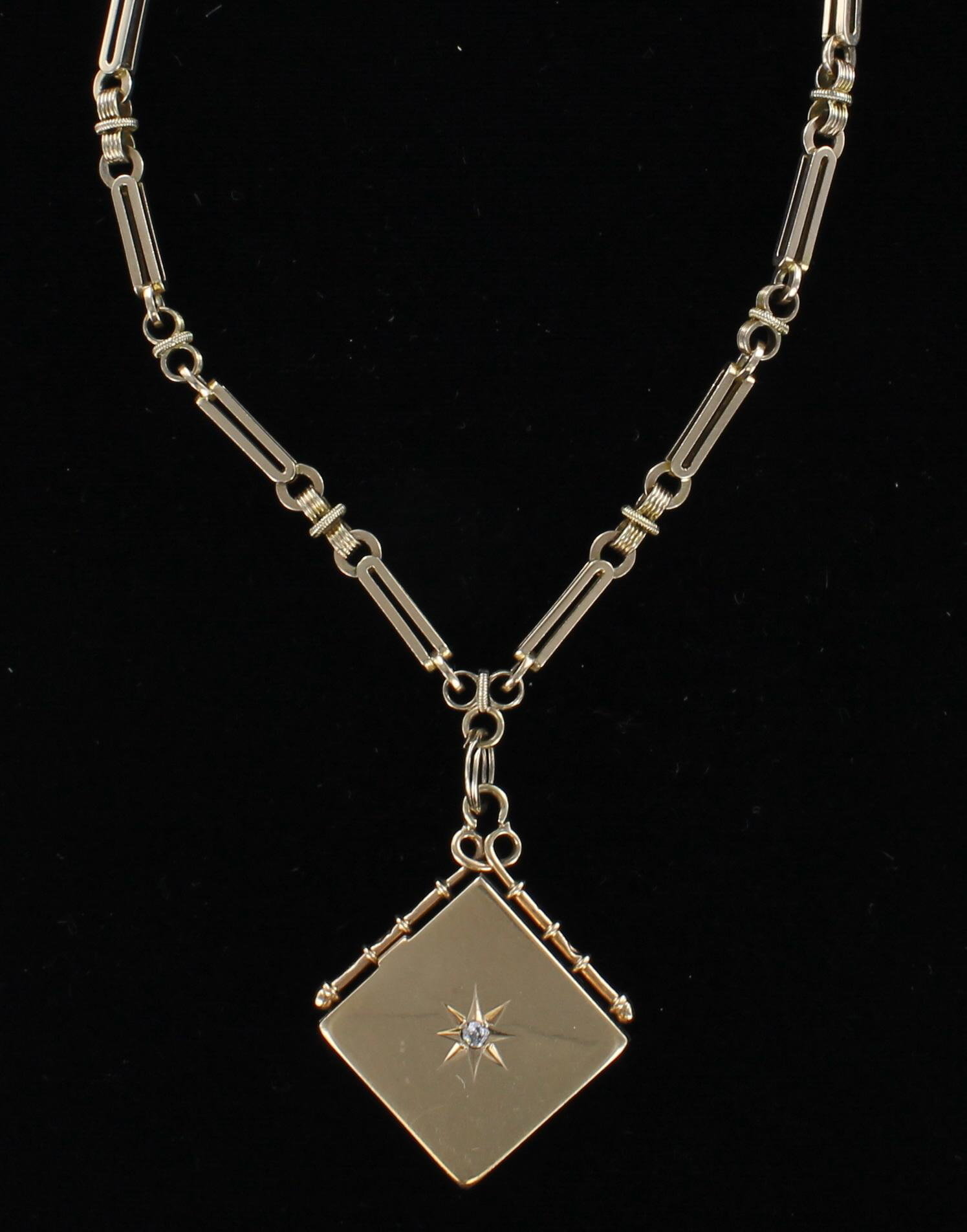 9KT LOCKET WITH WATCH CHAIN CIRCA 1900 205-2534