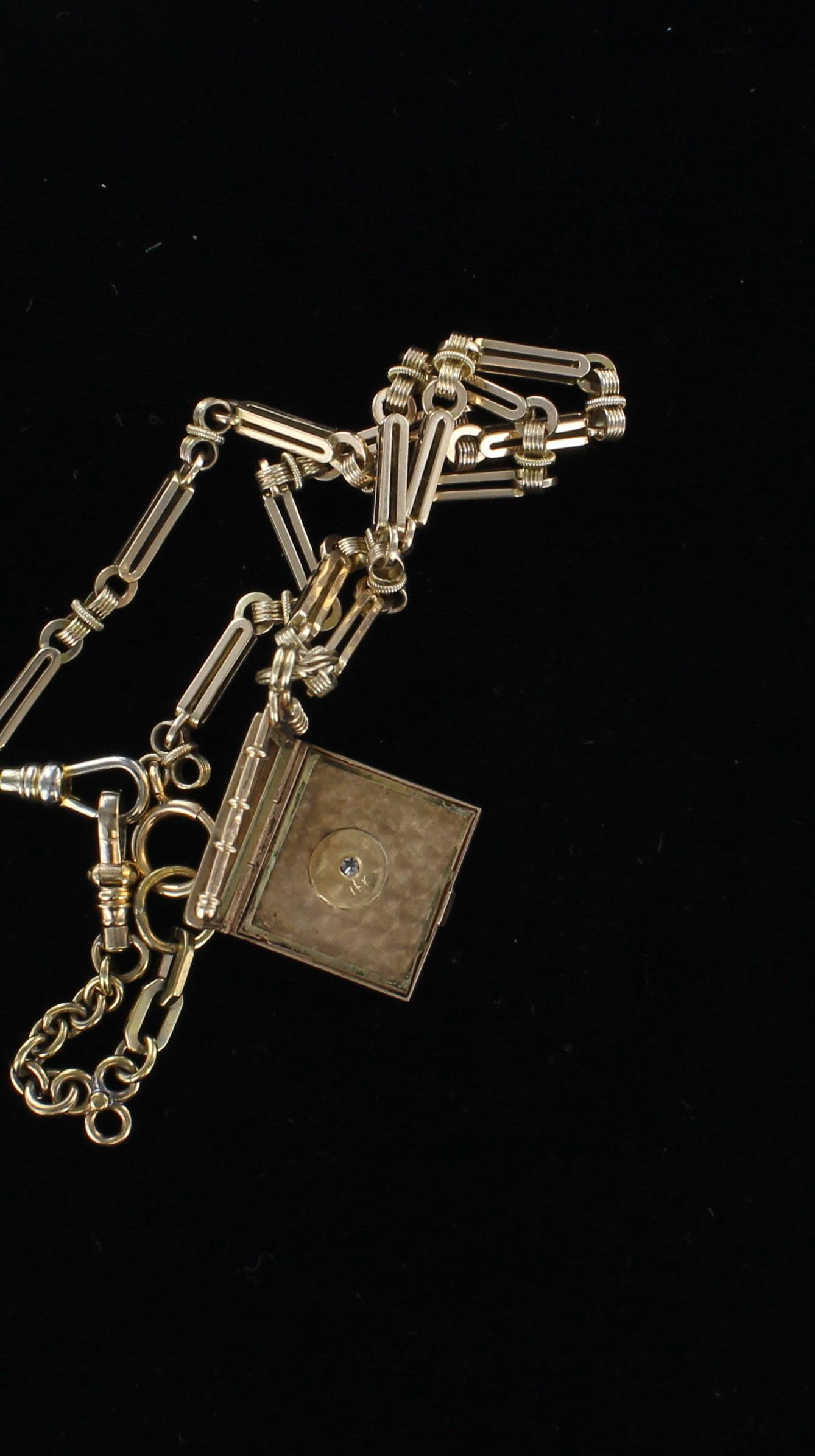 9KT LOCKET WITH WATCH CHAIN CIRCA 1900