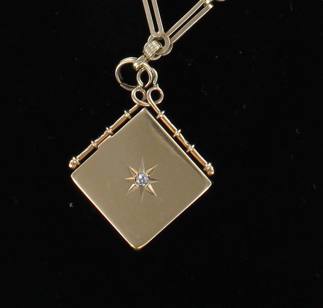9KT LOCKET WITH WATCH CHAIN CIRCA 1900