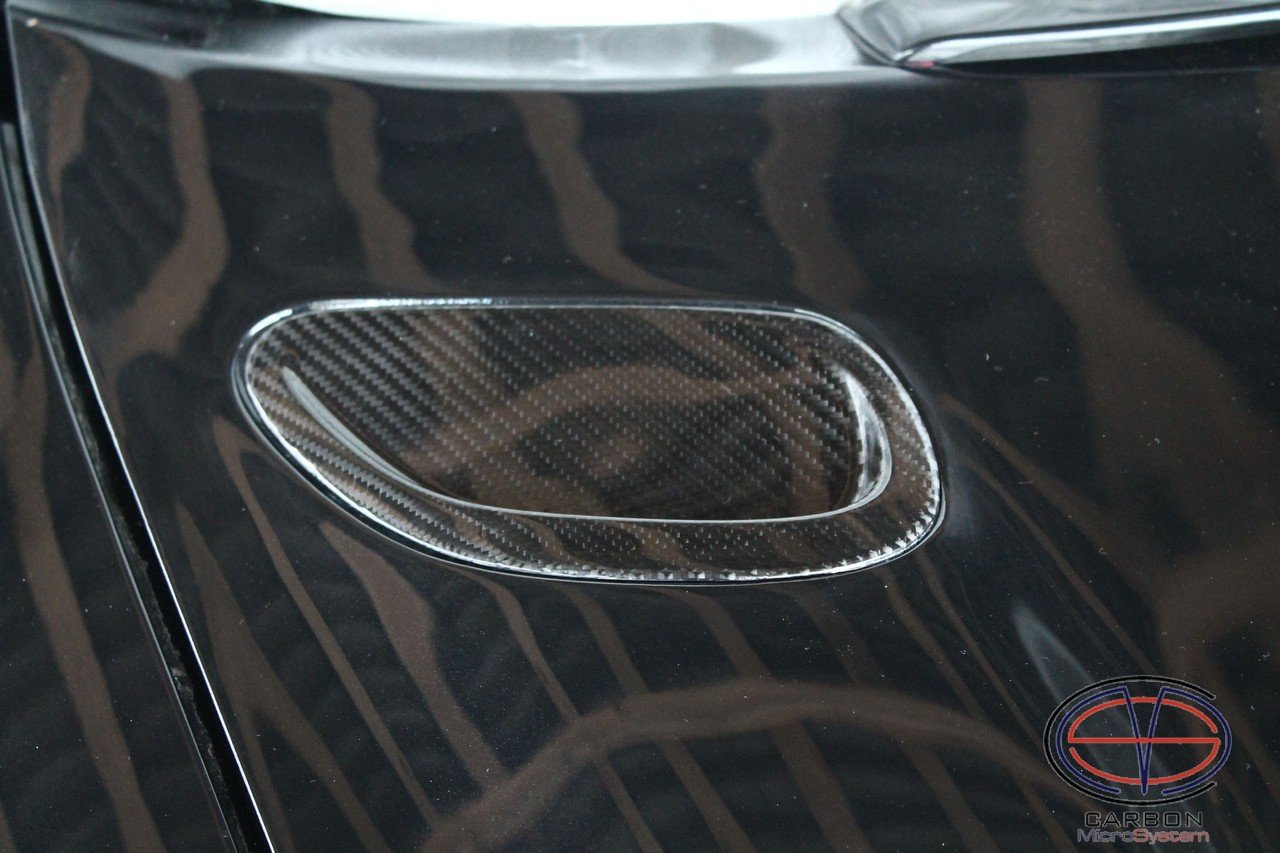 Inserts in hood from Carbon fiber