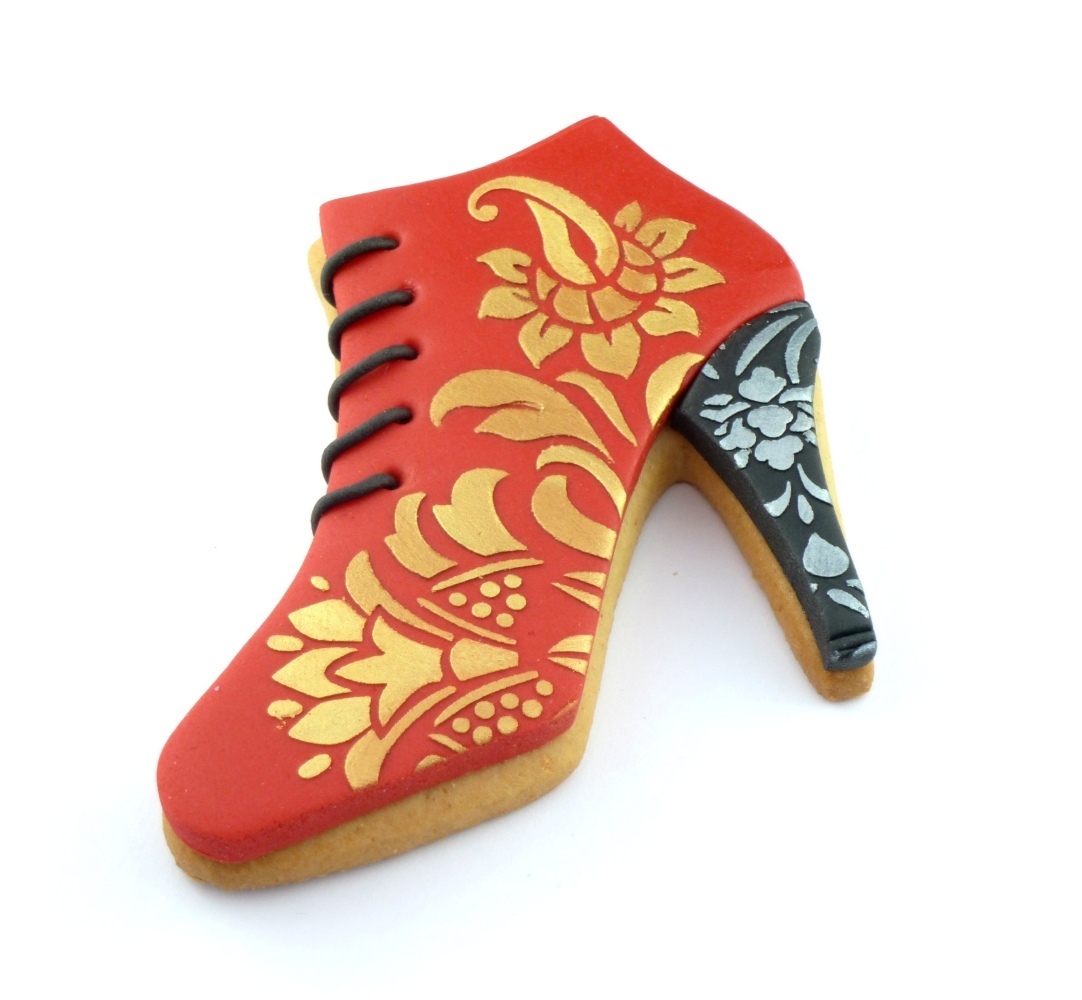 Red and gold decorated ankle boot cookie