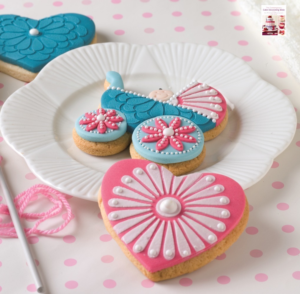 Decorated baby pram cookie from Lindy's 'Contemporary cake decorating bible' book