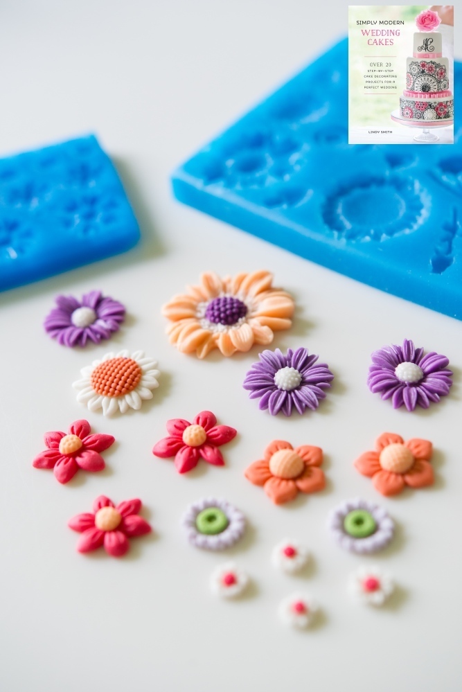 Moulded sugar flowers from the mini misc set FL107 as used in Lindy's Simply Modern Wedding Cakes' book. Note the lilac daisies are from the small daisy set.
