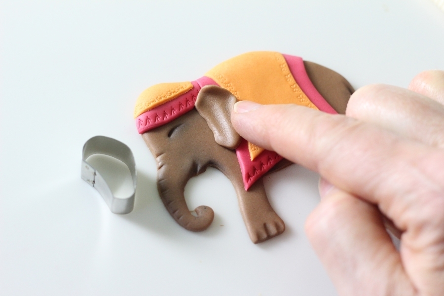 Adding an ear to the sugar elephant