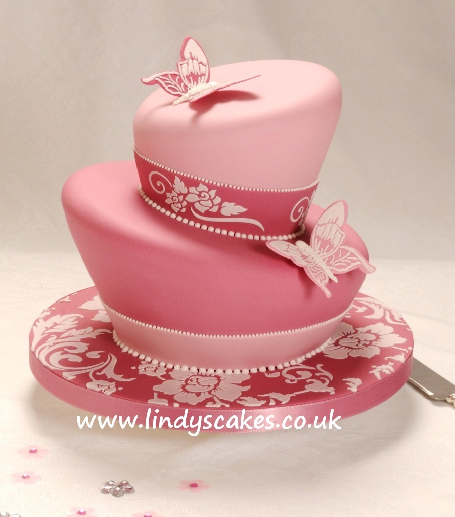 Large butterfly cutter used in conjunction with a butterfly stencil - cake from Lindy's wonky cakes DVD