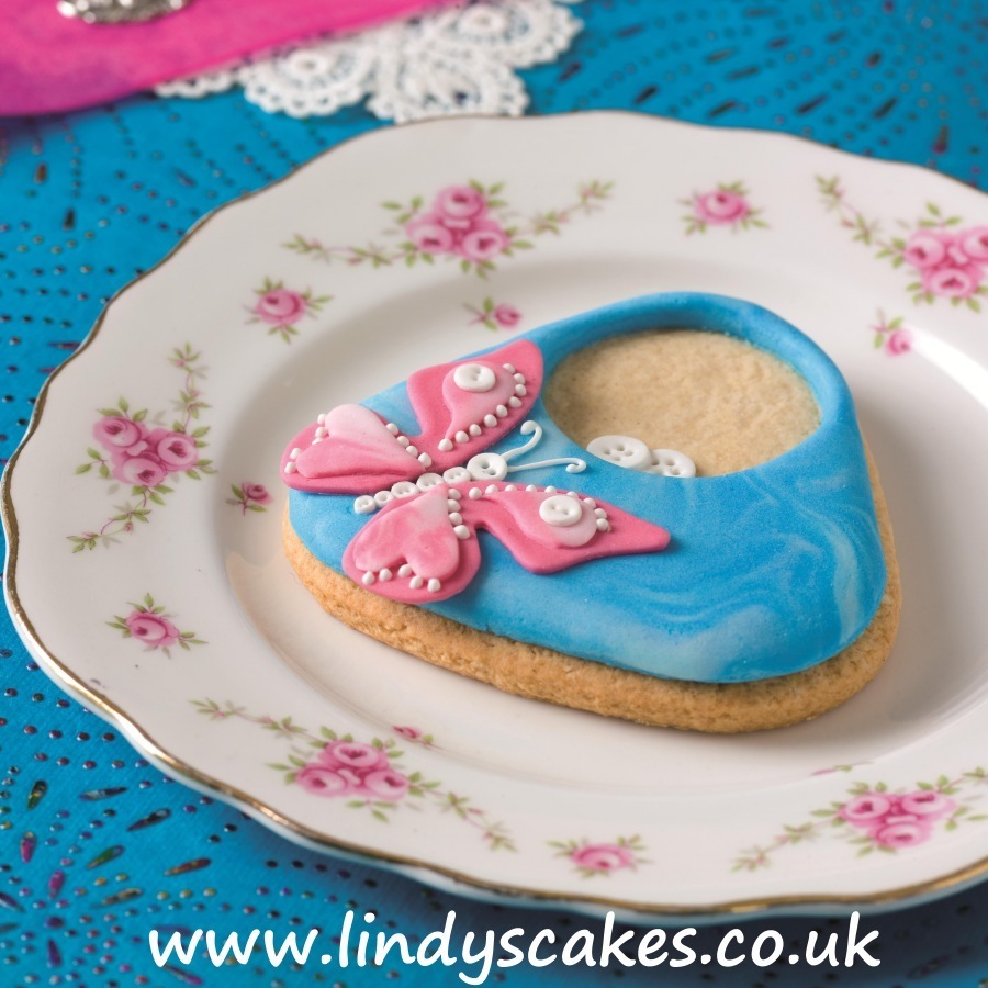Butterfly button bag cookie from author Lindy Smith's 'Contemporary Cake Decorating Bible' book