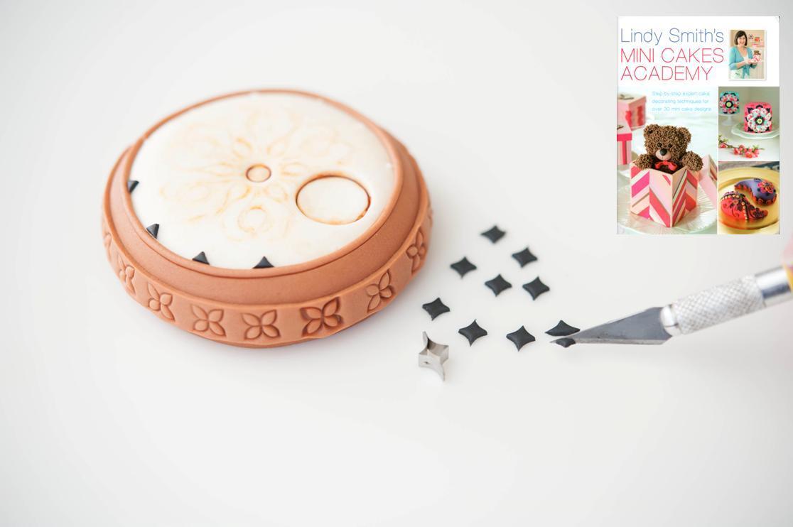 Cutting the shapes for the hours using the scallop diamond cutter