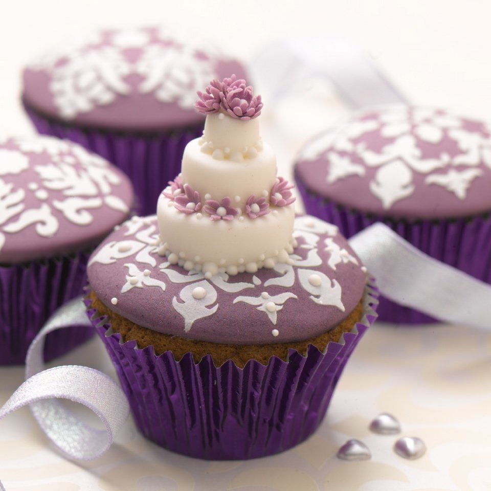 Tiered white wedding cupcake from Lindy Smith's 'bake me i'm yours ...cupcake celebration' book