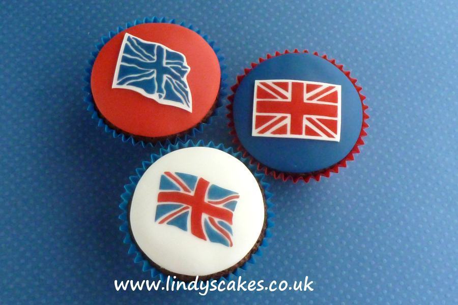 Lindy's flag cutters used with her union jack cake stencils to decorate cupcakes