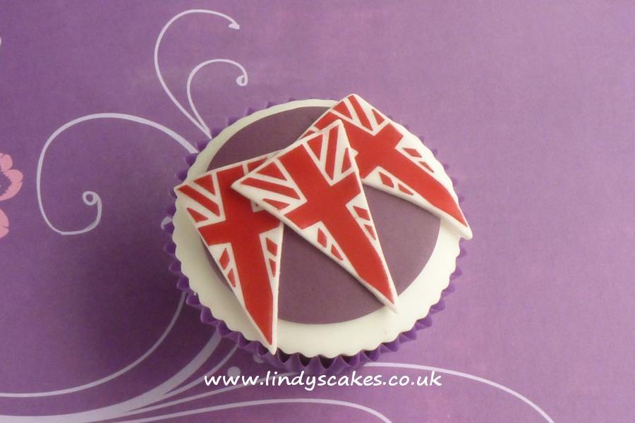 Sugarcraft bunting cutter used to decorate a simple cupcake