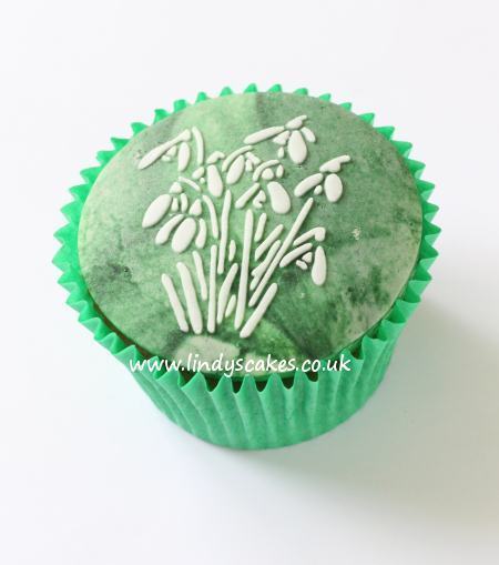 Snowdrops stencilled onto a cupcake
