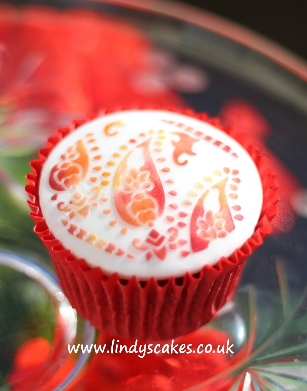 paisley cupcake stencil decorated with colourful edible dusts