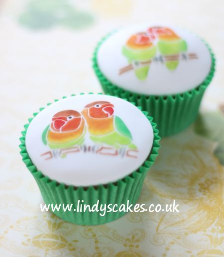 Lovebirds make a perfect cupcake top decoration, here shown in traditional colouring