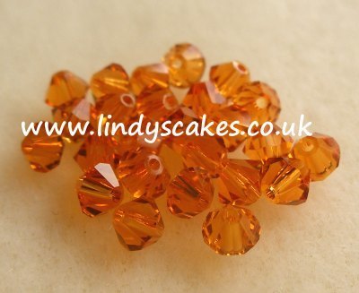 Brown - Topaz Swarovski Crystals (4mm) SKU17554131