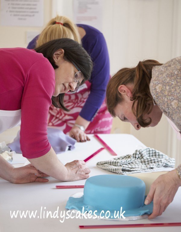 Class to perfecti the finish on a celebration cake