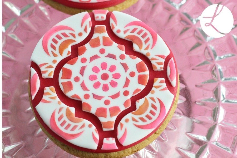 Tiled mandala stencil used to decorate a cookie