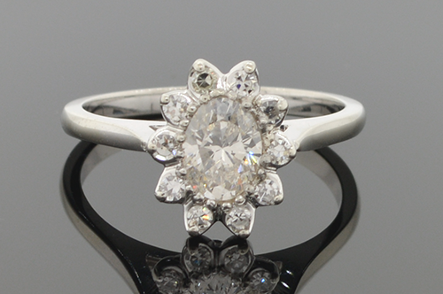 Item #4352 Flower Ring With Oval Diamond Center 4352