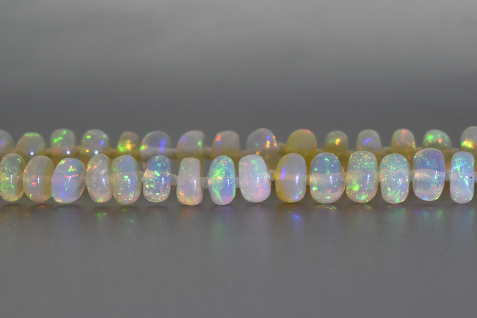 Item #1709 Strand of Vibrant Crystal Opal Roundel Beads