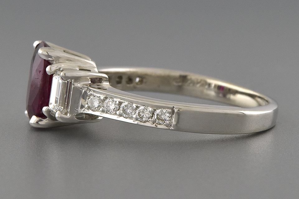 Ruby and Diamond Three Stone Ring with Diamond Details