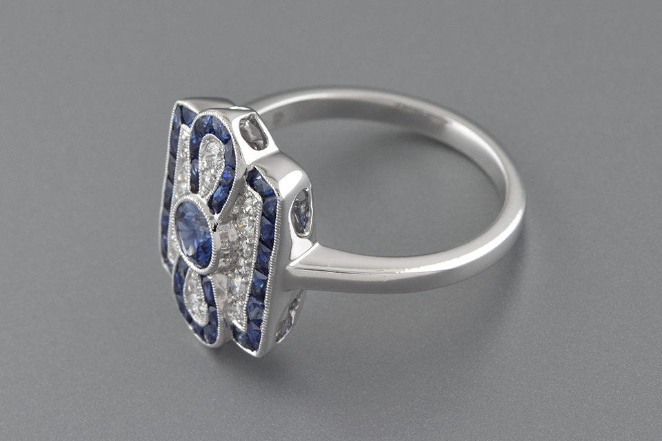 Sapphire and Diamond Ring with Infinity Design