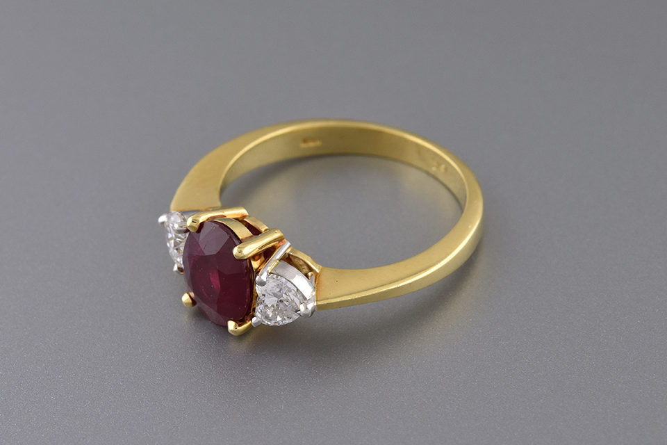 Ruby Ring with Heart Shaped Side Diamonds