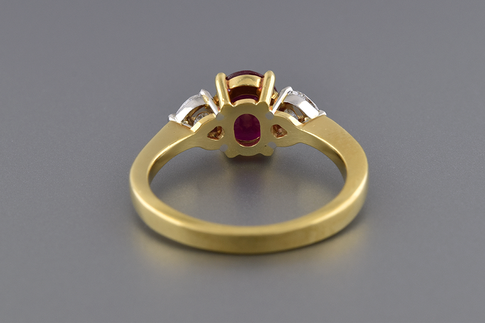 Ruby Ring with Heart Shaped Side Diamonds