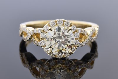 Halo Diamond Engagement Ring with a Twist Halo Diamond Engagement Ring with a Twist